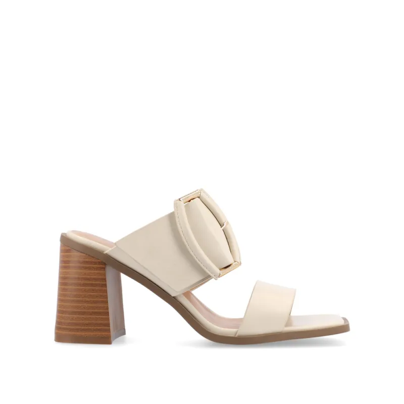 JUNIE BLOCK HEEL MULES IN FAUX LEATHER sold by Journee Collection