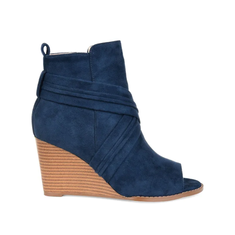 SABEENA WEDGE HEELED BOOTIE IN FAUX SUEDE sold by Journee Collection