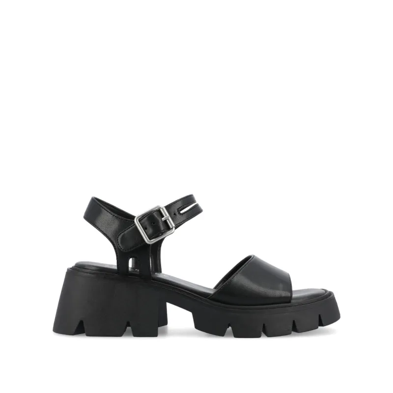 TILLEE LUG SOLED SANDALS IN FAUX LEATHER sold by Journee Collection