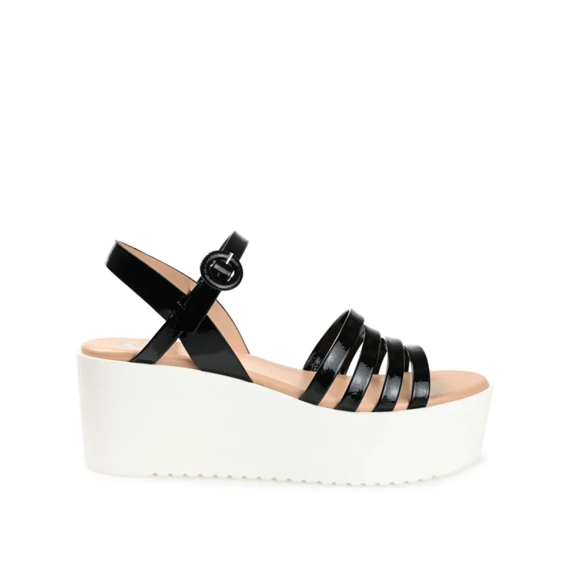 MIRAGGE PLATFORM SANDALS IN FAUX LEATHER sold by Journee Collection