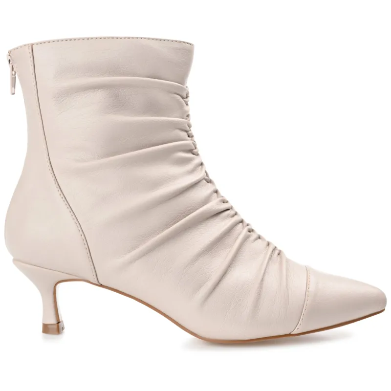CHEVI POINTED-TOE BOOTIES IN FAUX LEATHER sold by Journee Collection