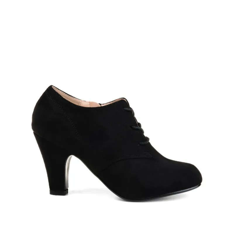 LEONA LACE-UP BOOTIES IN WIDE - Black sold by Journee Collection