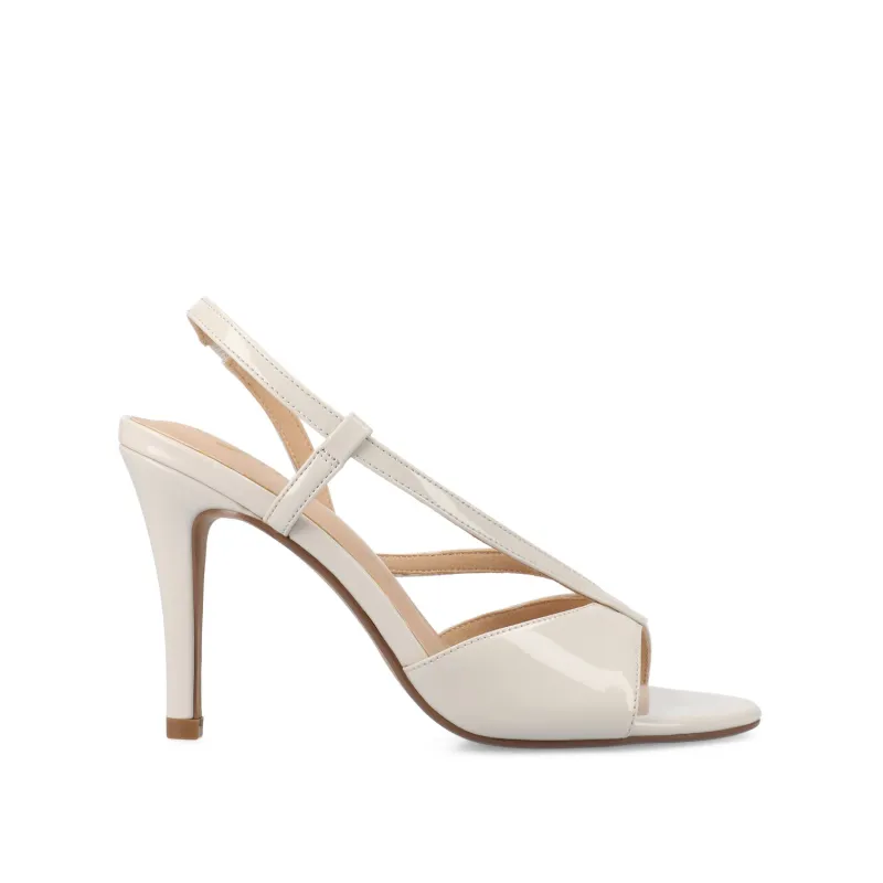 VARRA DRESS SANDALS - Bone Patent sold by Journee Collection