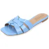 ARRINA STATEMENT PATENT SLIDE SANDALS IN WIDE sold by Journee Collection