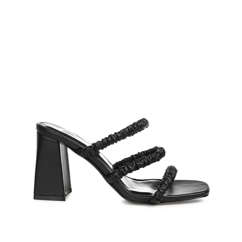 REAGAAN HEELED SANDALS sold by Journee Collection