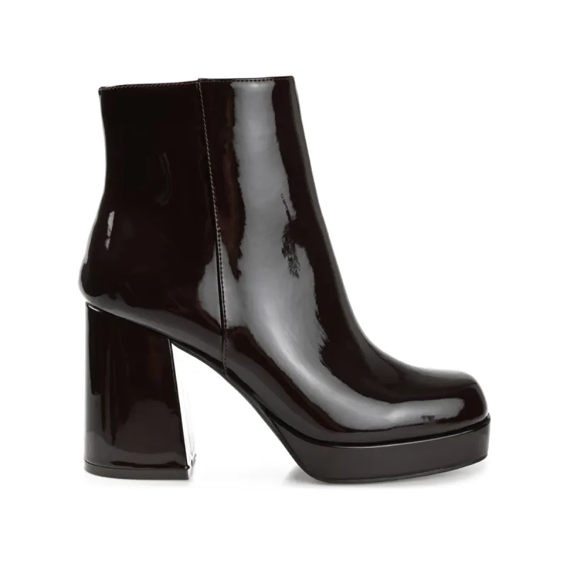 MOLLIE BLOCK HEELED BOOTIES IN PATENT sold by Journee Collection