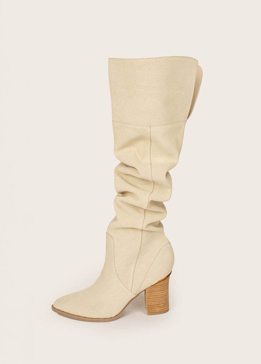 Nyra Slouch Boot in Ivory sold by Joyfolie