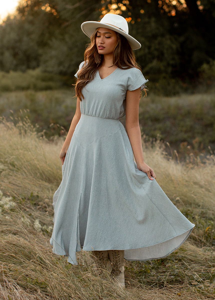 Jessah Dress in Dusty Blue sold by Joyfolie