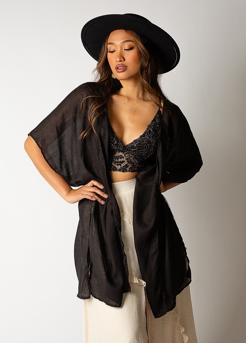 Deidre Duster in Black sold by Joyfolie