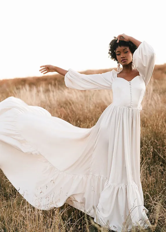 Lorna Impact Dress in Cream sold by Joyfolie