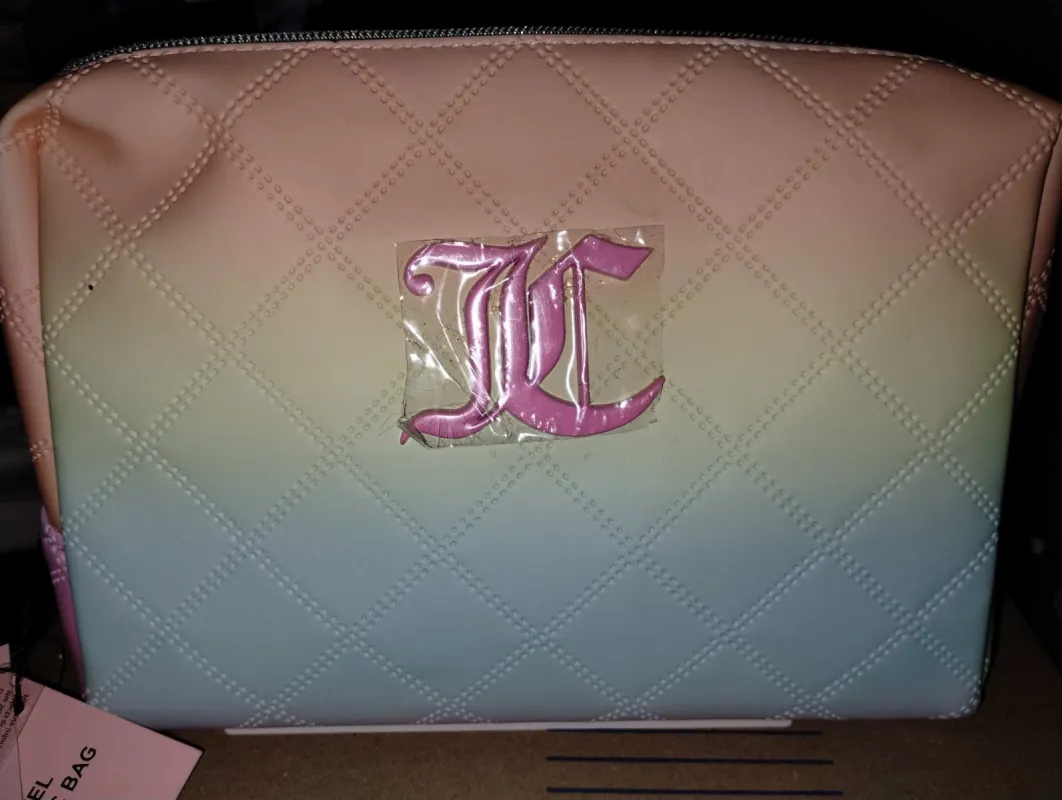 Travel Cosmetic Bag—REJUICED sold by Juicy Couture