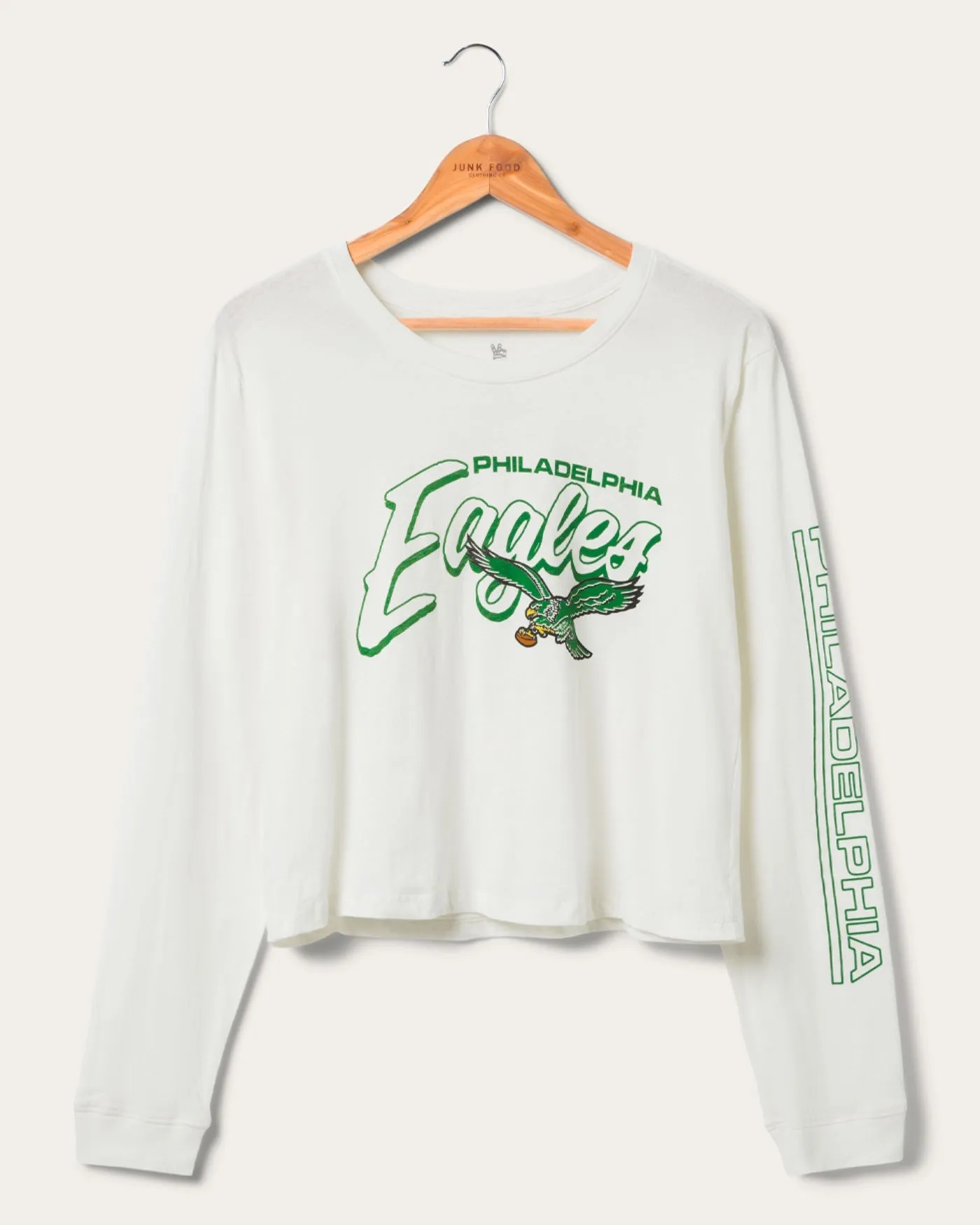 Women's Philadelphia Eagles Touchdown Long Sleeve Cropped Tee sold by Junk Food Clothing