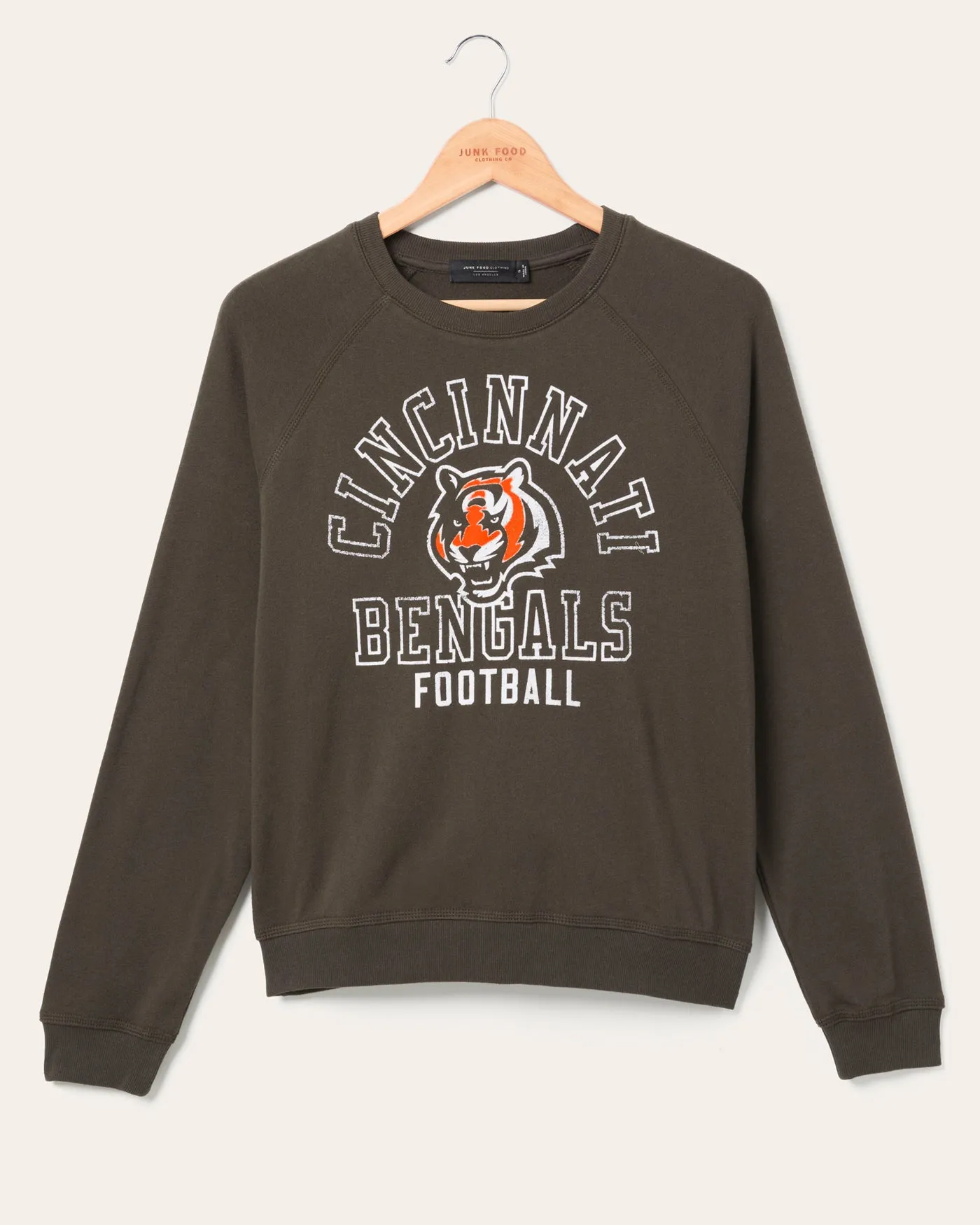 Women's Cincinnati Bengals Flocked Raglan Crew Fleece sold by Junk Food Clothing