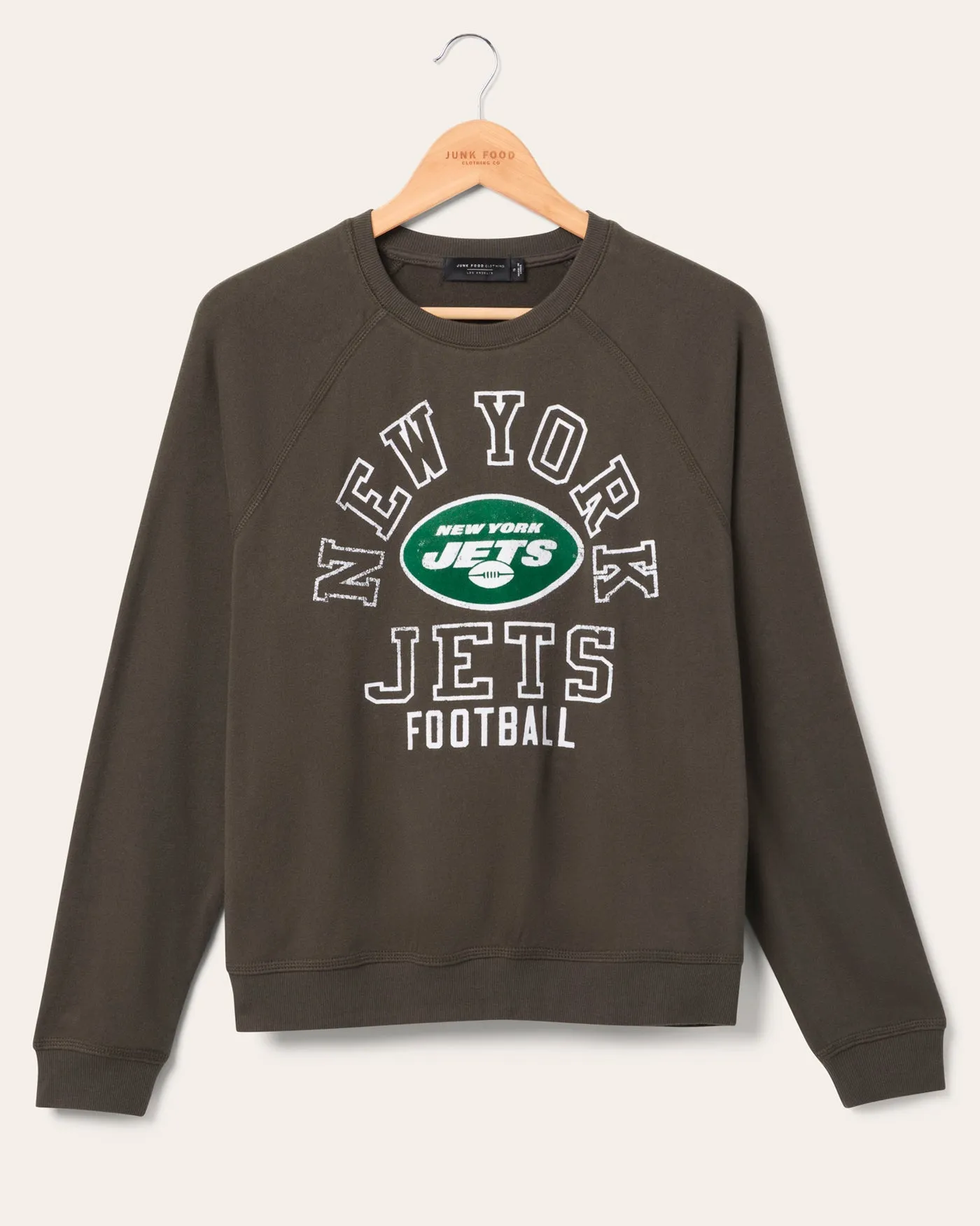 Women's New York Jets Flocked Raglan Crew Fleece sold by Junk Food Clothing