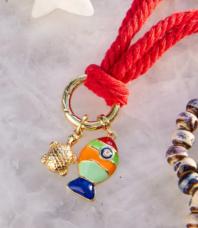 Fish And Turtle Charm Cord Necklace sold by Karen Kane