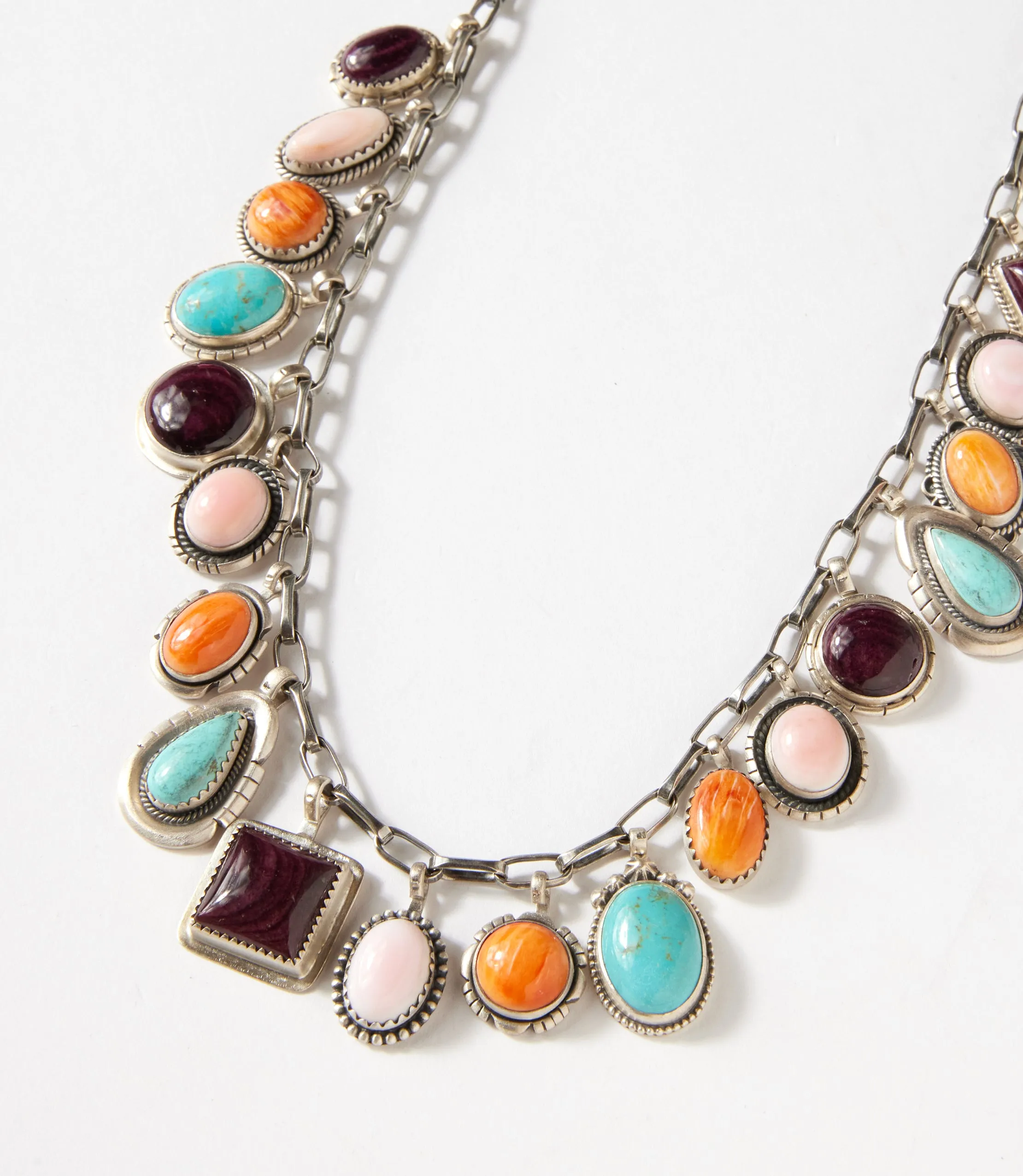 Dangling Turquoise, Spiny Oyster, and Pink Conch Necklace sold by Karen Kane