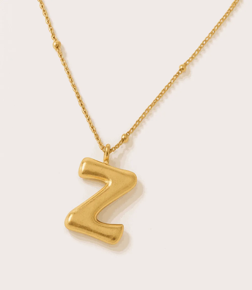 Gold Bubble Letter Charm Necklace sold by Karen Kane