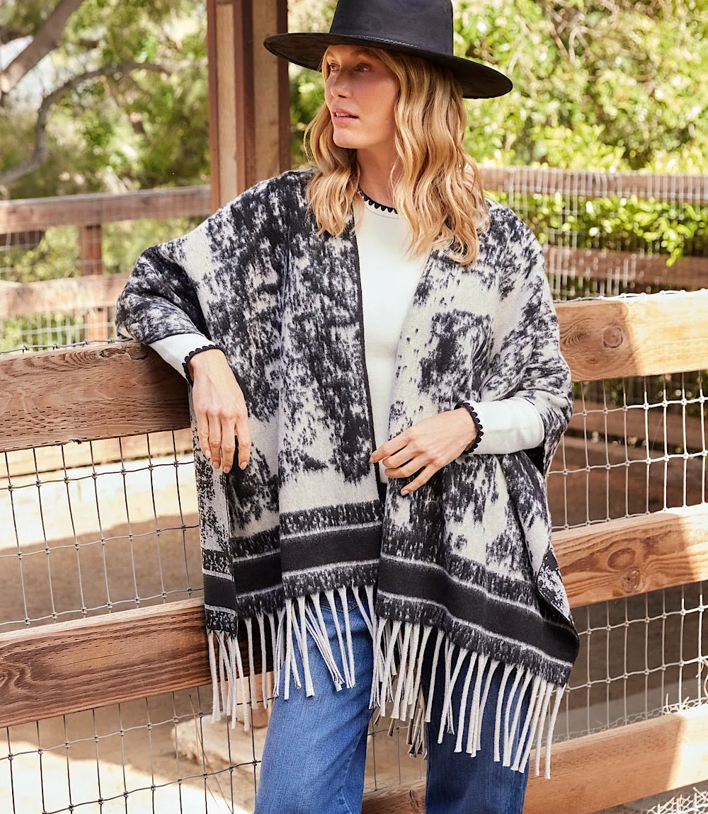 Brushed Jacquard Knit Fringe Poncho sold by Karen Kane