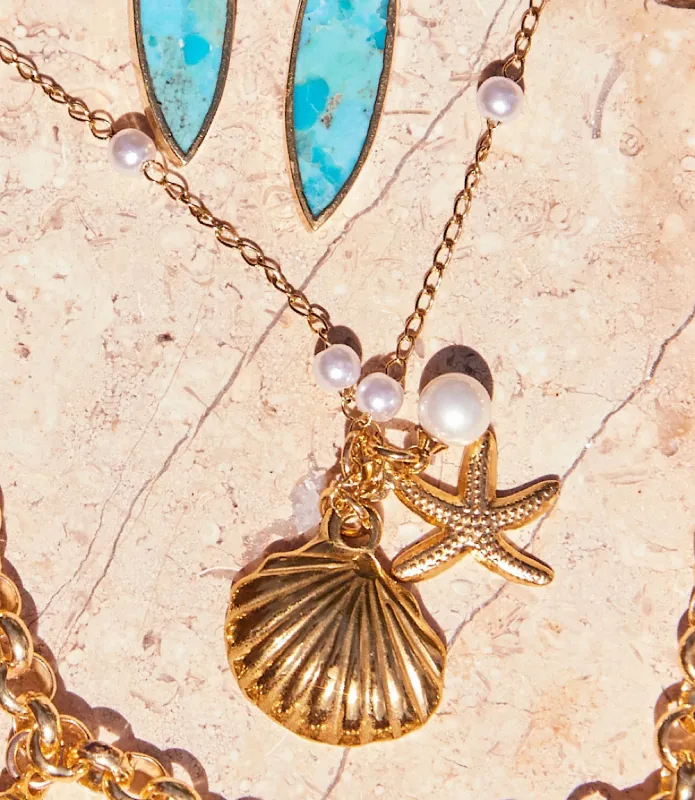 Ocean Charm Necklace sold by Karen Kane