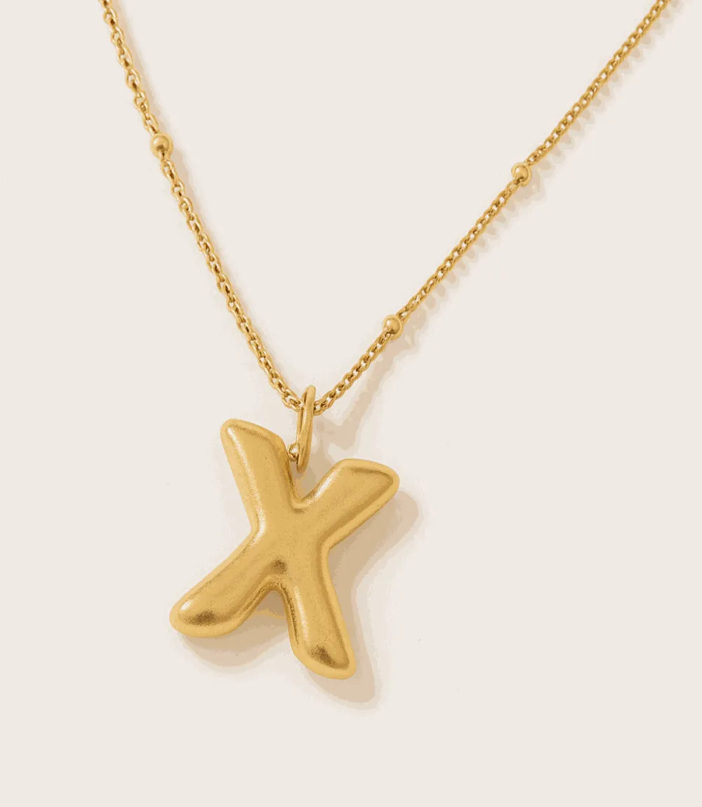 Gold Bubble Letter Charm Necklace sold by Karen Kane