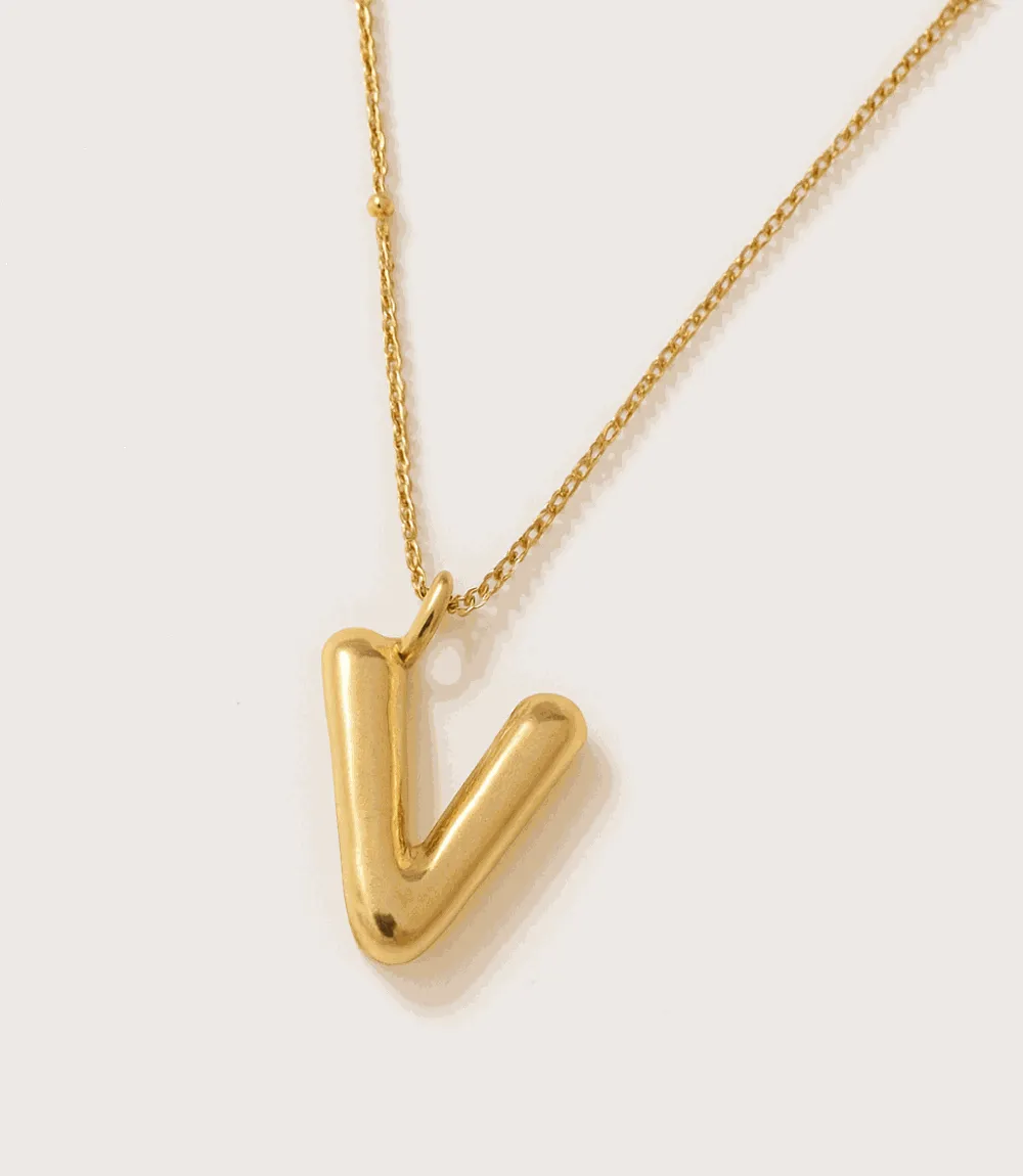 Gold Bubble Letter Charm Necklace sold by Karen Kane