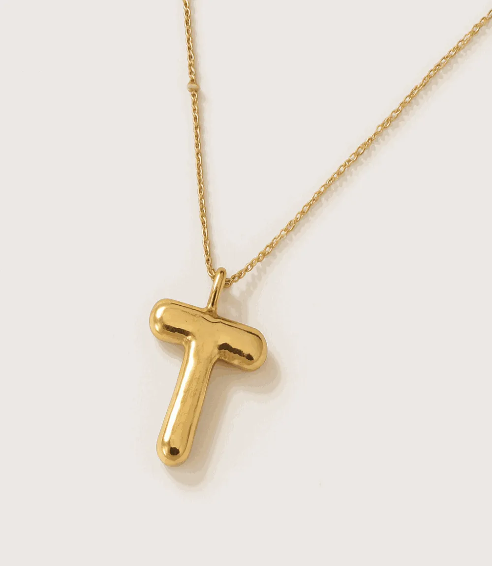Gold Bubble Letter Charm Necklace sold by Karen Kane
