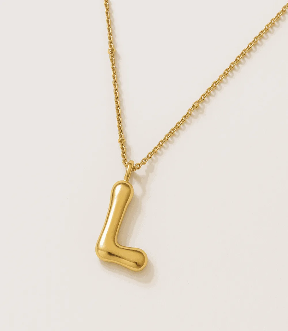 Gold Bubble Letter Charm Necklace sold by Karen Kane