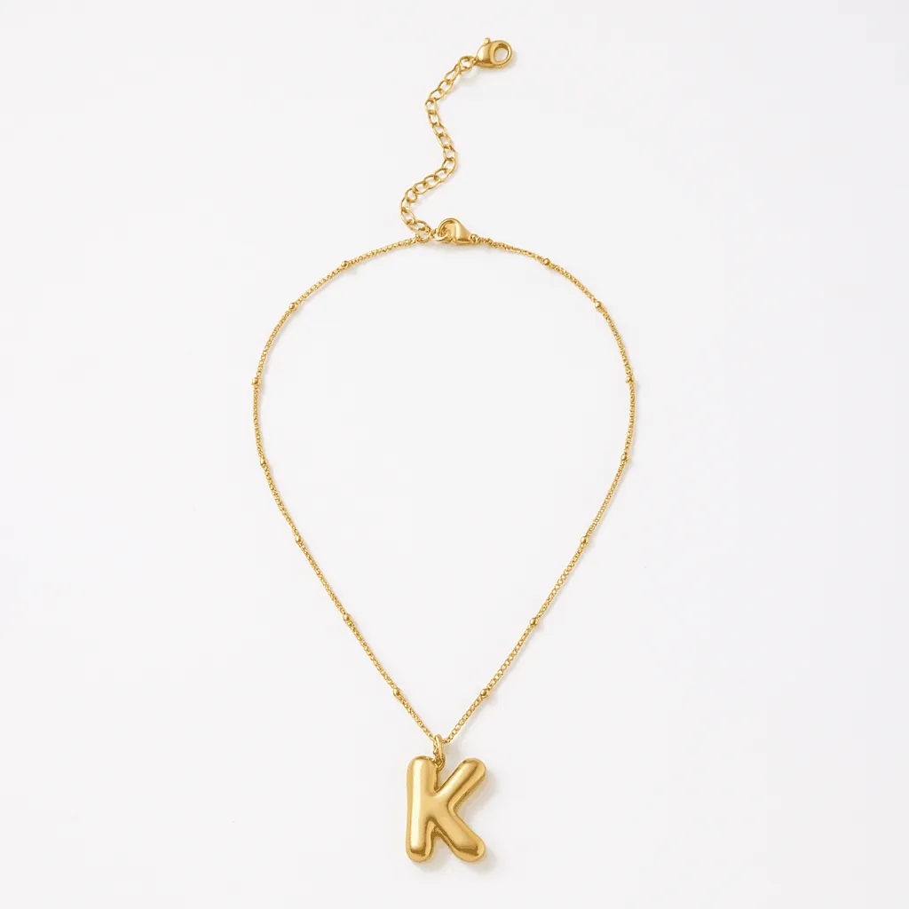 Gold Bubble Letter Charm Necklace sold by Karen Kane product image thumbnail 2