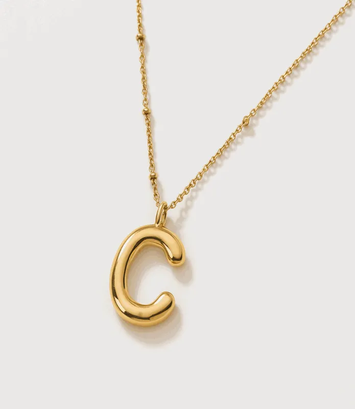 Gold Bubble Letter Charm Necklace sold by Karen Kane