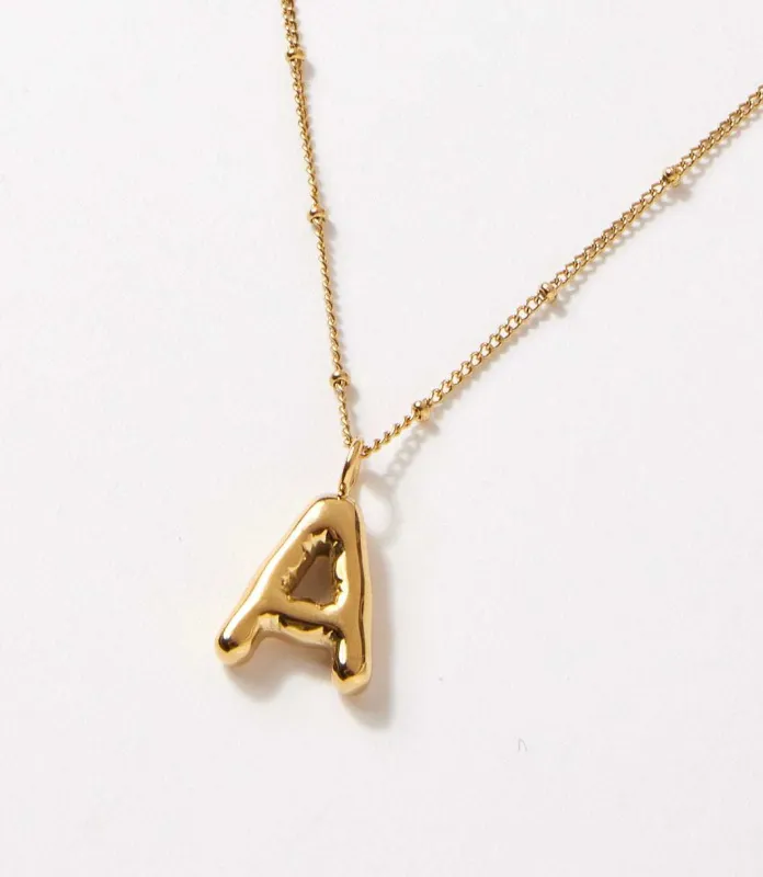Gold Bubble Letter Charm Necklace made by Karen Kane
