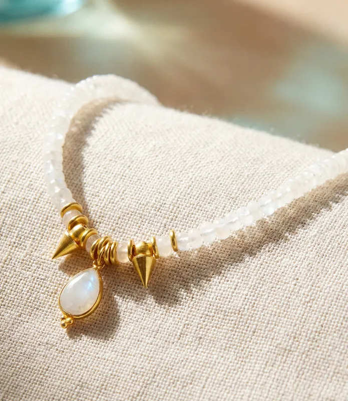 Moonstone Pendant And Charm Necklace sold by Karen Kane