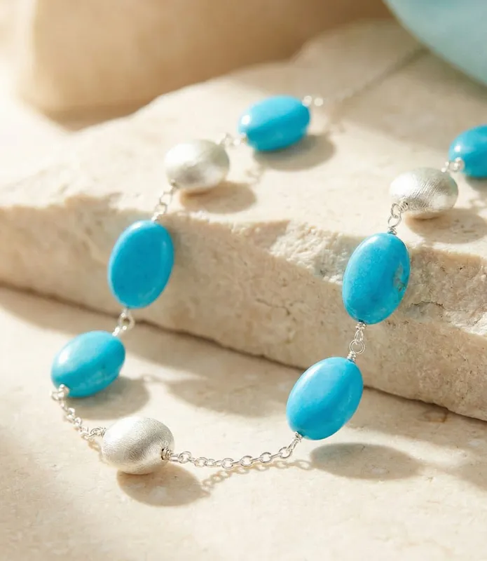 Turquoise And Silver Bead Station Necklace made by Karen Kane