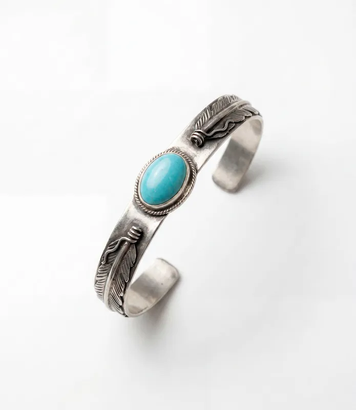 Feather Embellished Turquoise Cuff Bracelet made by Karen Kane