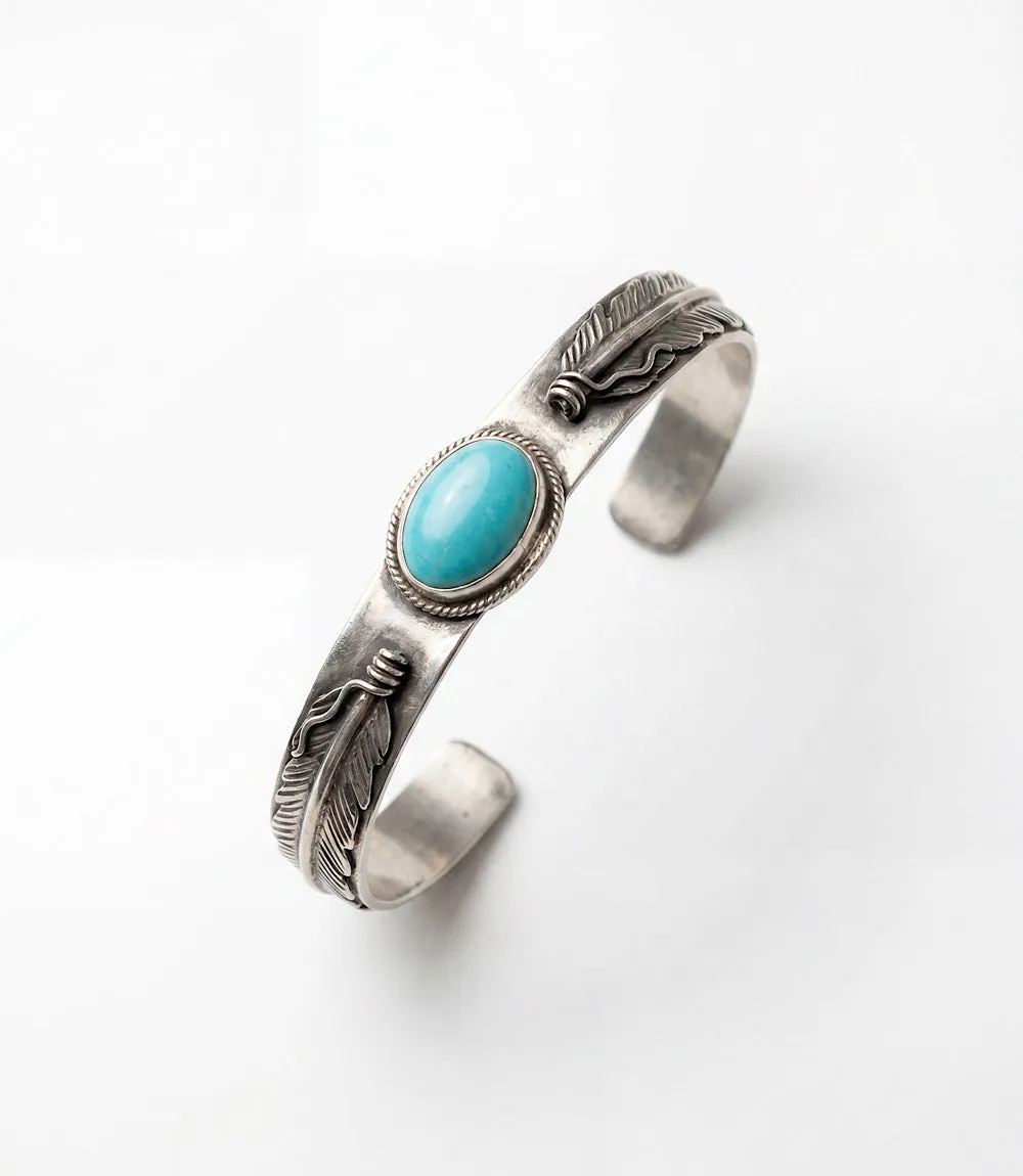 Feather Embellished Turquoise Cuff Bracelet sold by Karen Kane