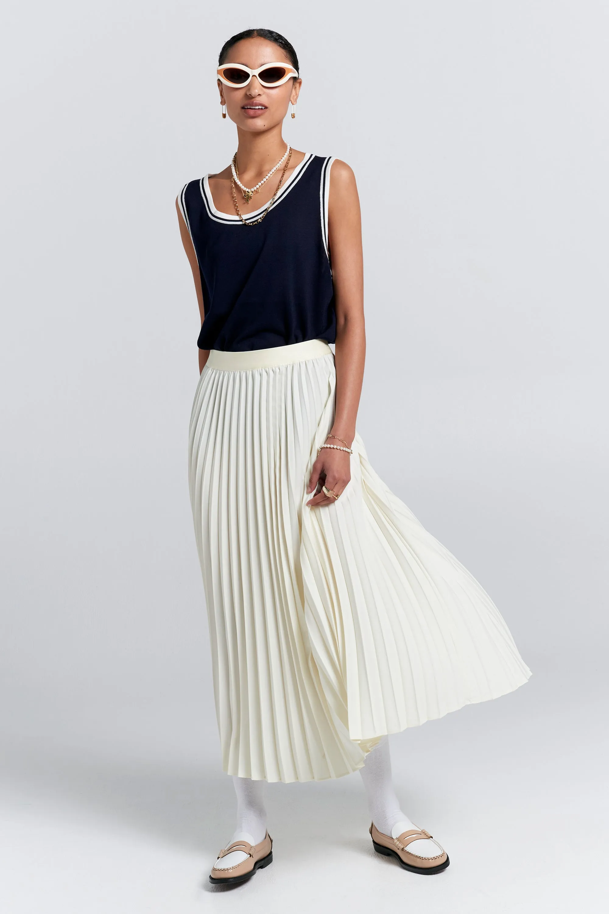 Sunray Pleated Skirt Cream sold by Karen Walker