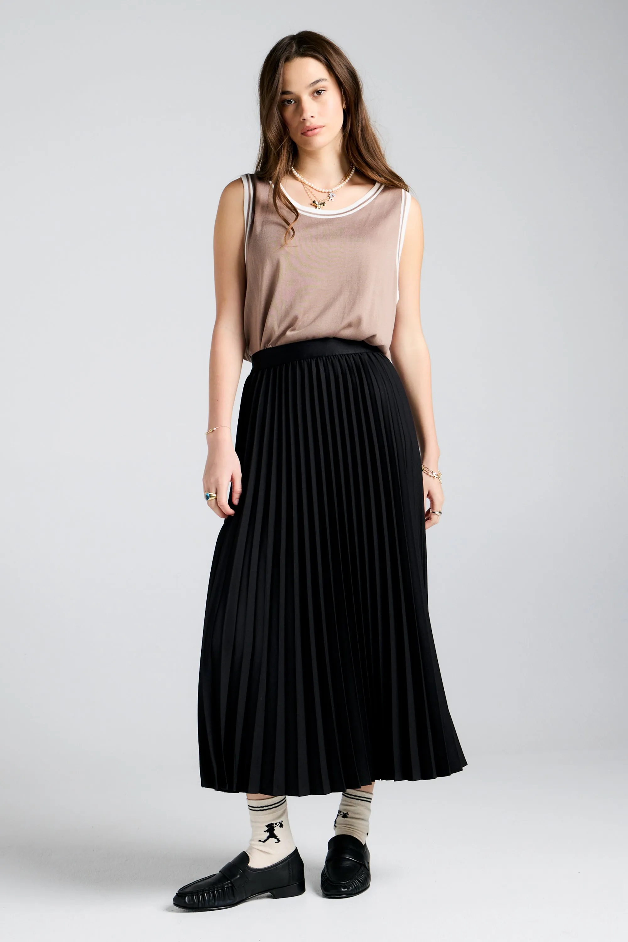Sunray Pleated Skirt Black sold by Karen Walker