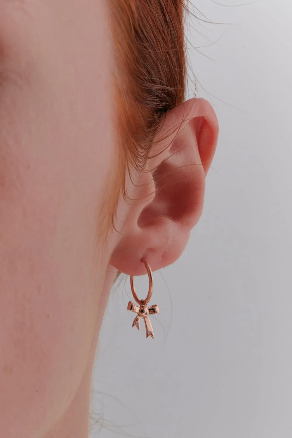Bow Hoop Earrings Rose Gold sold by Karen Walker