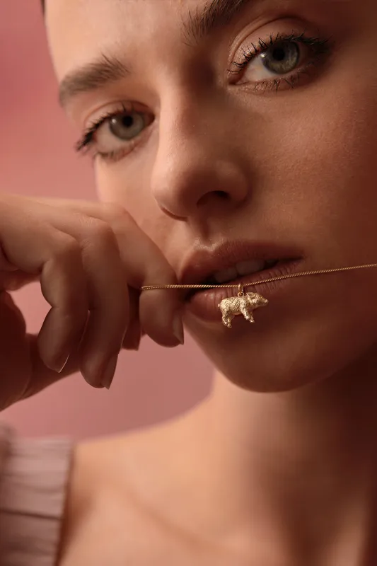 Pig Necklace Gold sold by Karen Walker