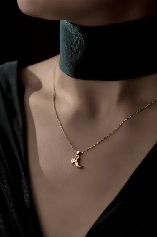 Moon and Star Charm Necklace Gold sold by Karen Walker