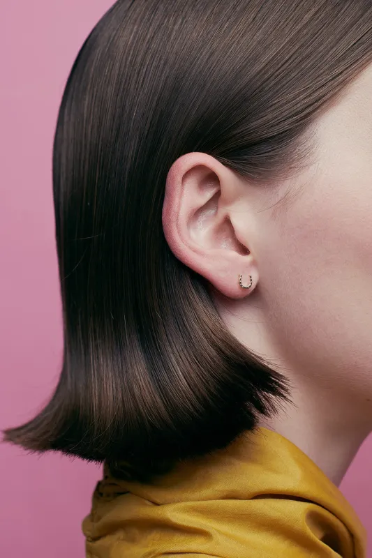 Mini Horseshoe Studs Gold sold by Karen Walker