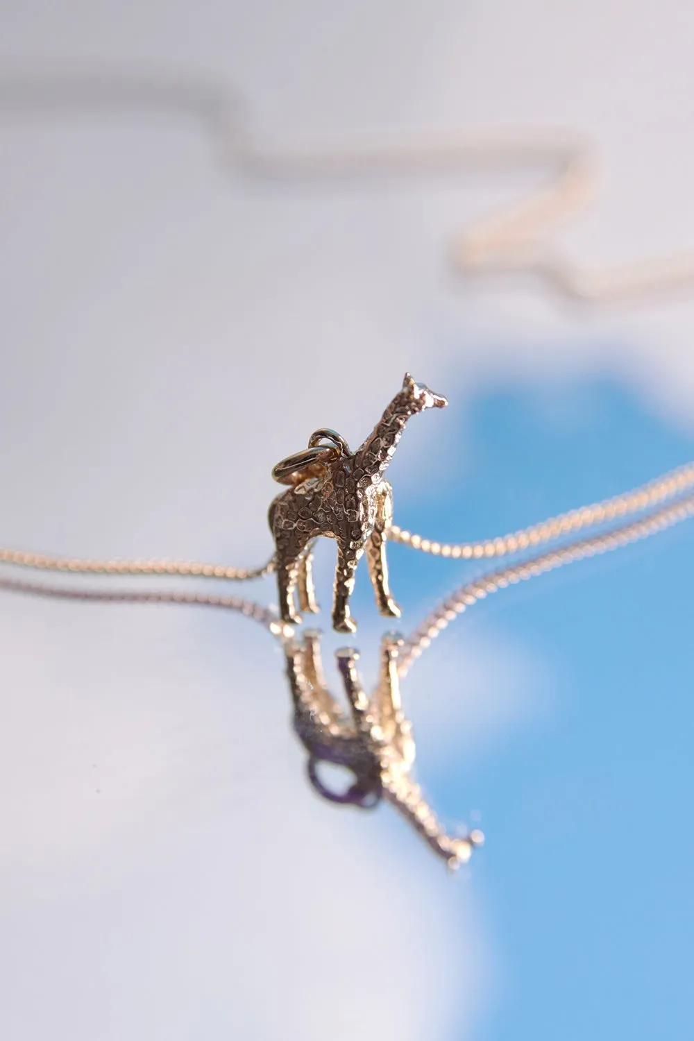 Giraffe Necklace Gold sold by Karen Walker