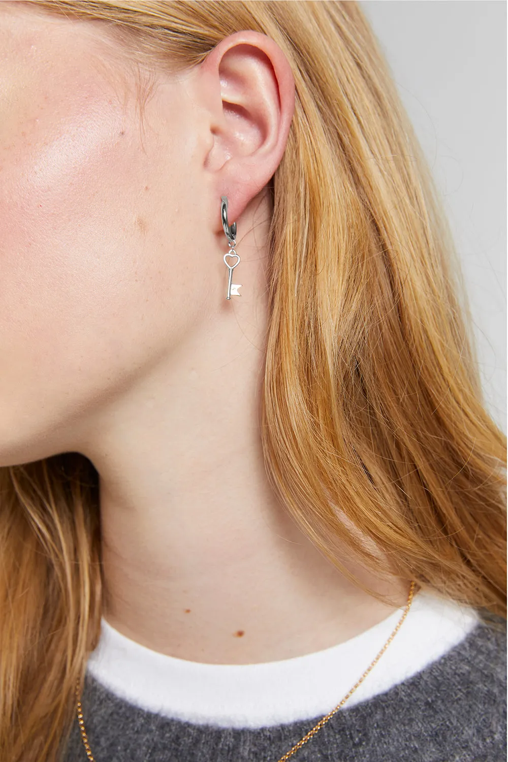 Monogram Key Earrings Silver sold by Karen Walker