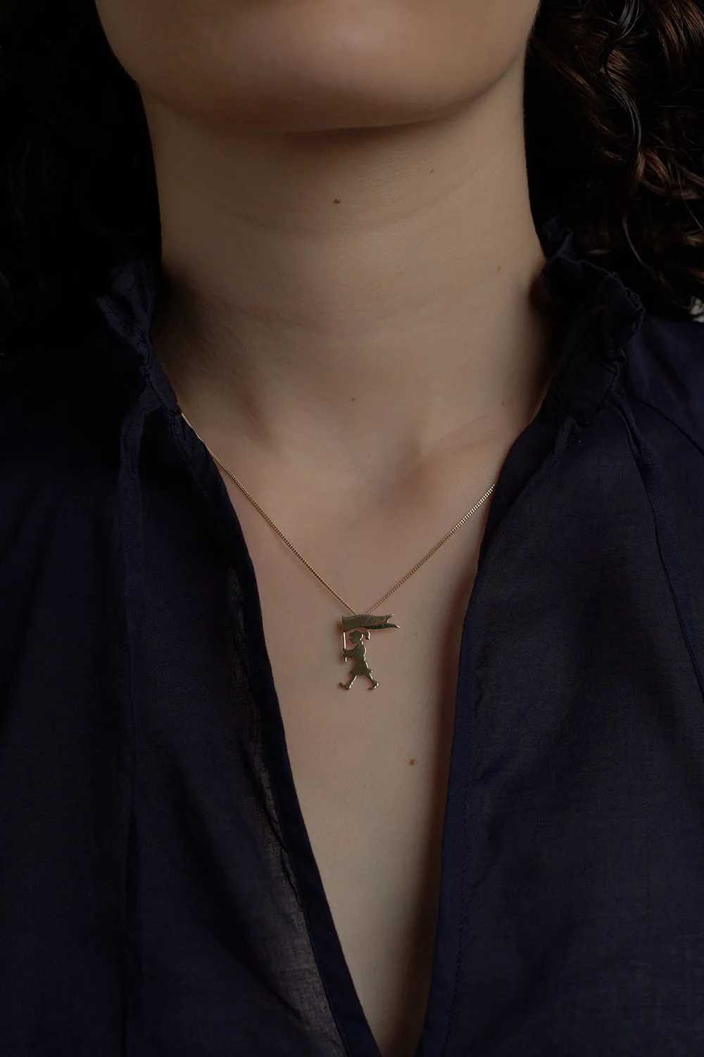 Marching Girl Necklace Gold sold by Karen Walker