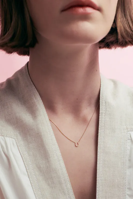 Mini Horseshoe Necklace Gold sold by Karen Walker