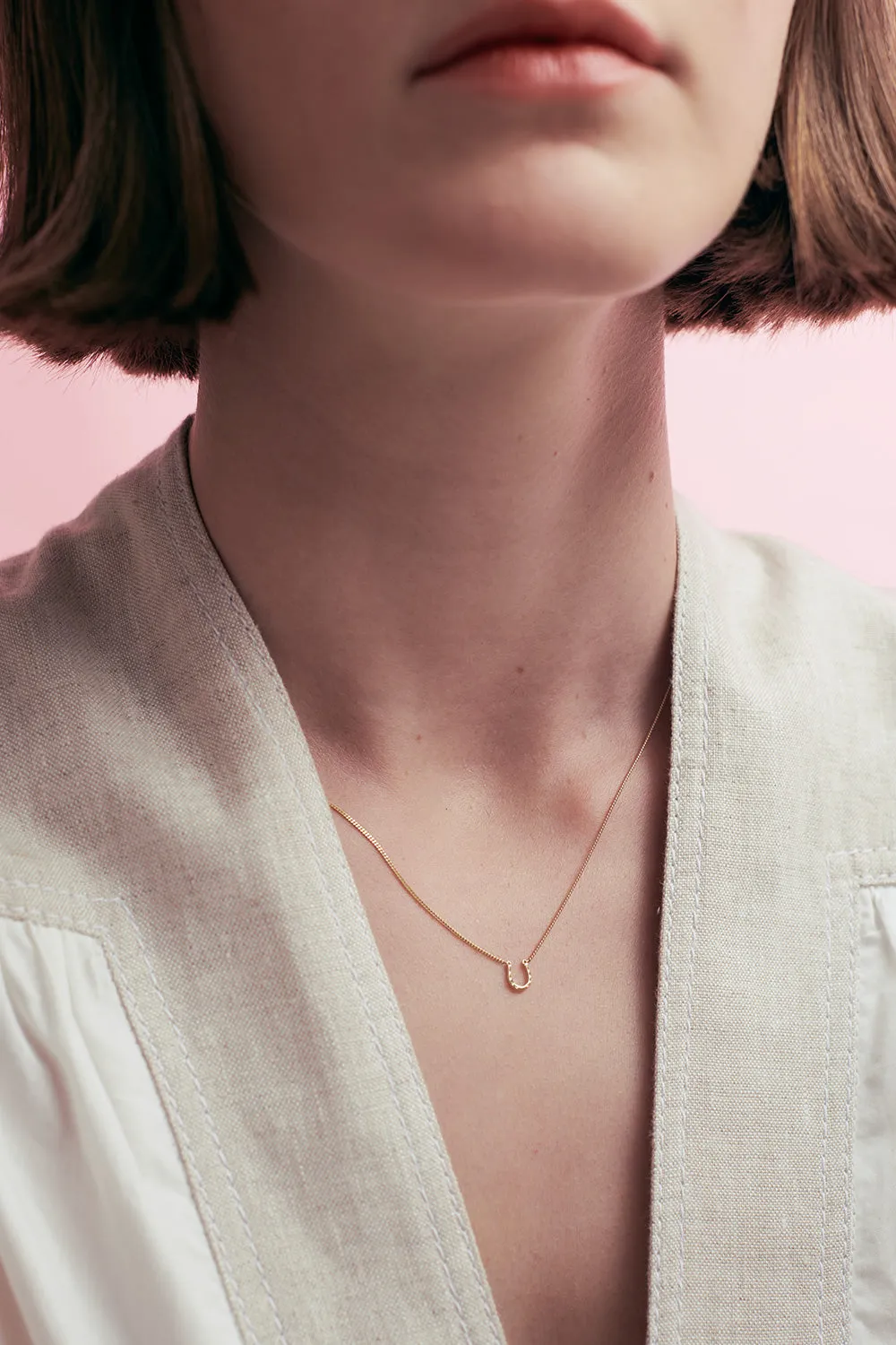 Mini Horseshoe Necklace Gold sold by Karen Walker