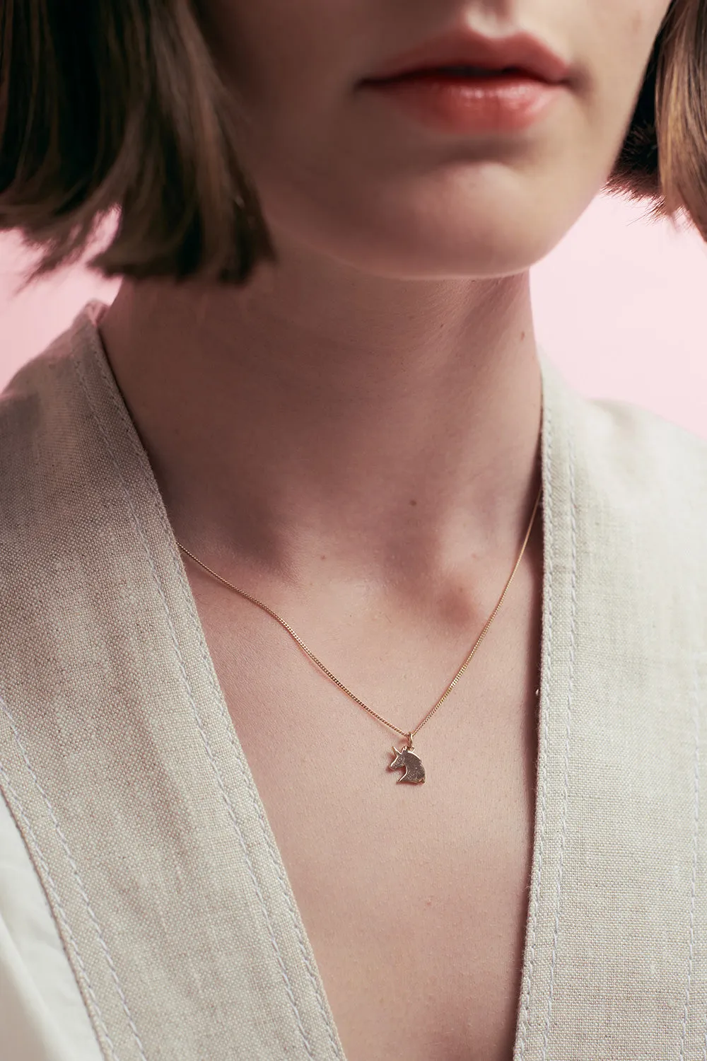 Mini Unicorn Necklace Gold sold by Karen Walker