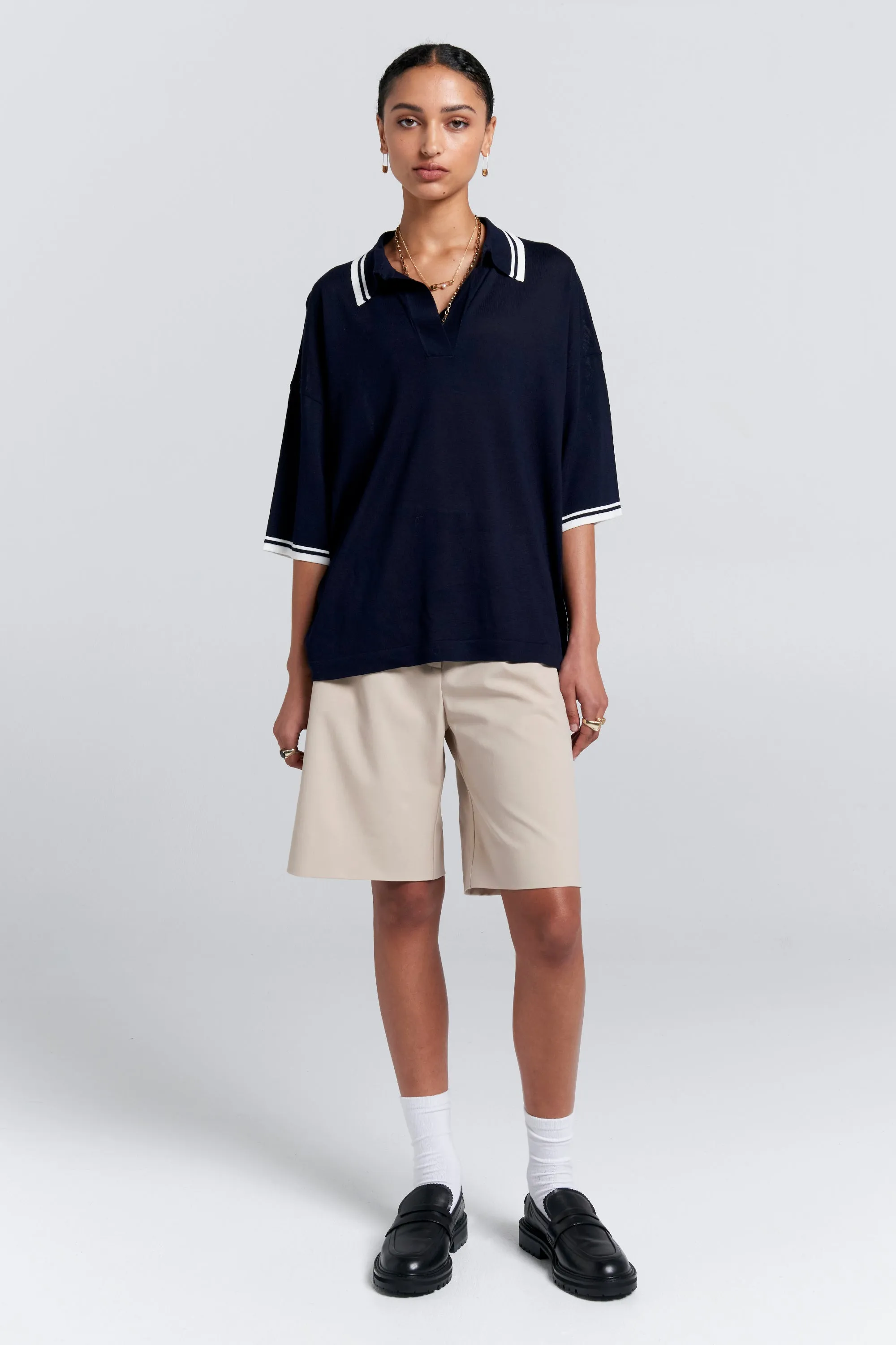 Relax Knit Polo Navy sold by Karen Walker