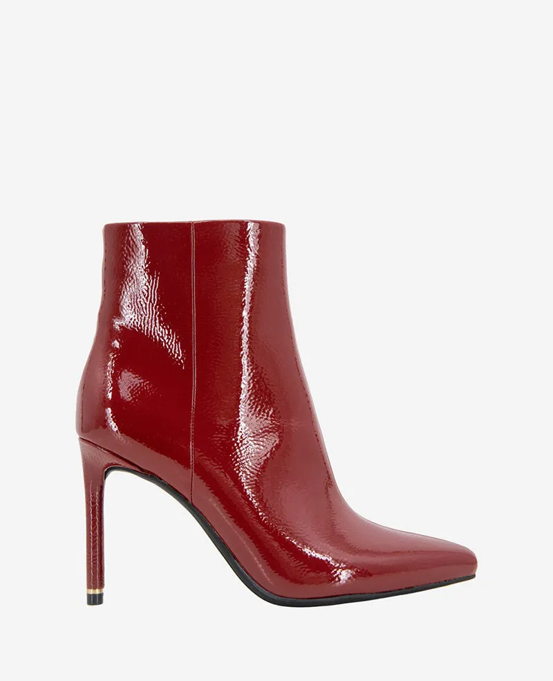 Quincy Patent Heel Ankle Bootie sold by Kenneth Cole
