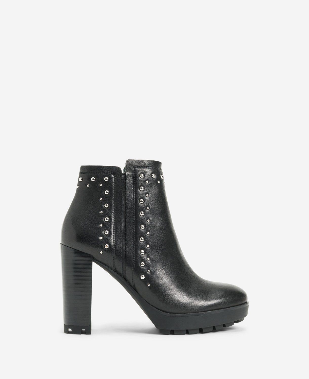 Justin Studded Lug Chelsea Boot with Polar Grip sold by Kenneth Cole