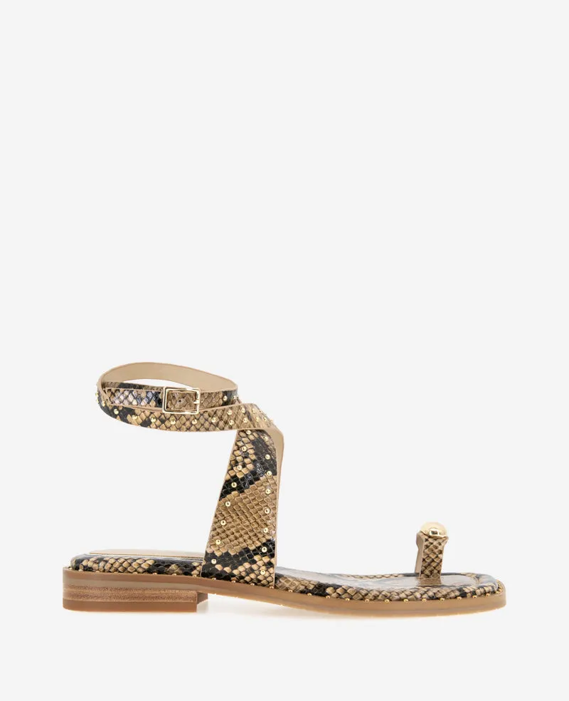 Raven Snake Print Studded Sandal sold by Kenneth Cole